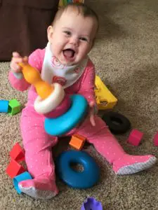 Baby playing with toys