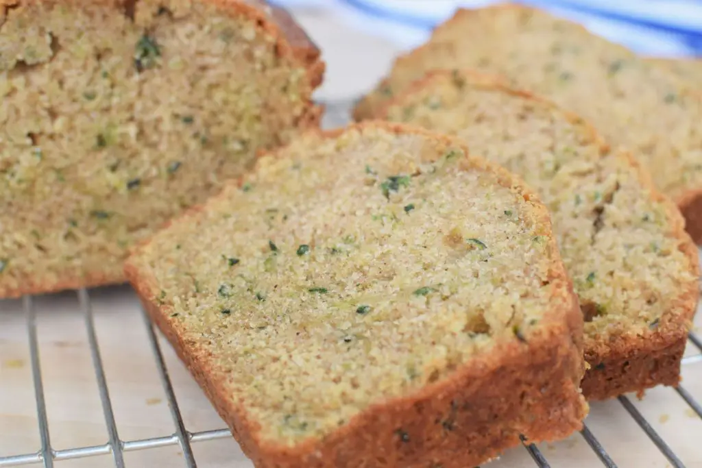 side look of a slice of zucchini loaf - this bread will rise