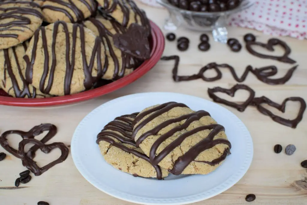 Love and hearts in chocolate around coffee cookies