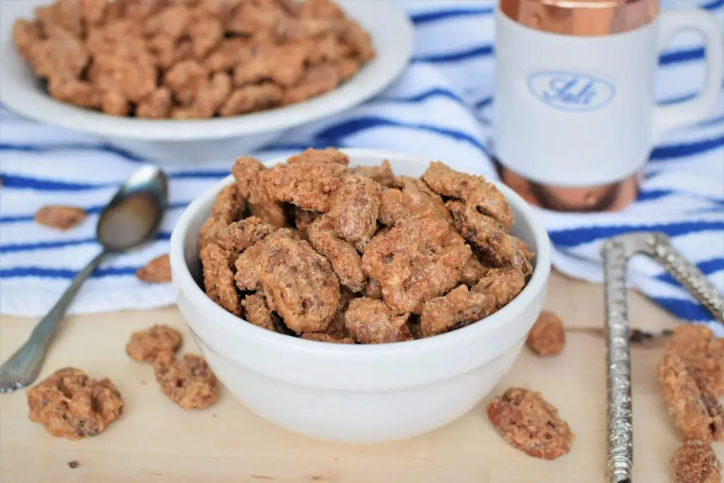 Served bowl of candied nuts with tools laying around