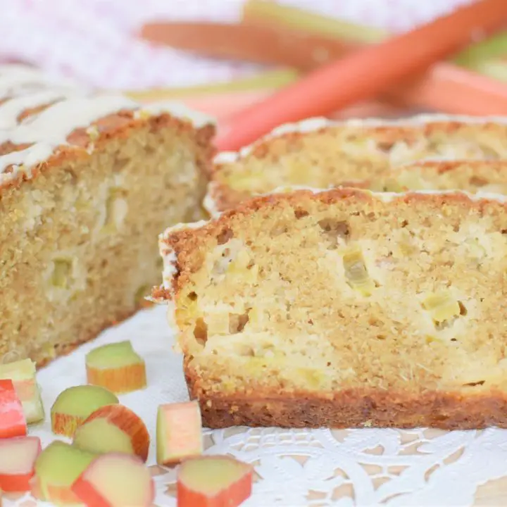 Sliced rhubarb bread in front of iced loaf - this bread will rise