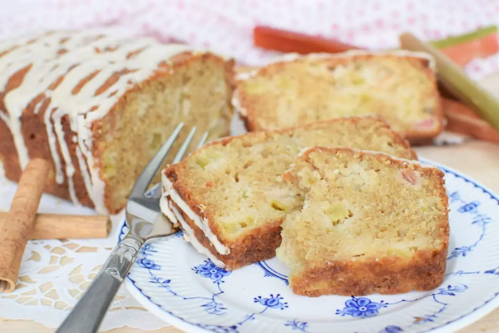 Drizzled rhubarb bread on a plate - this bread will rise