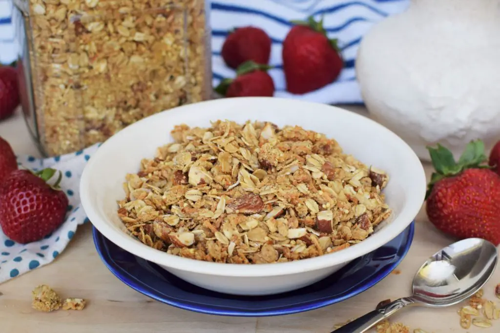 Bowl of coconut almond granola - this bread will rise