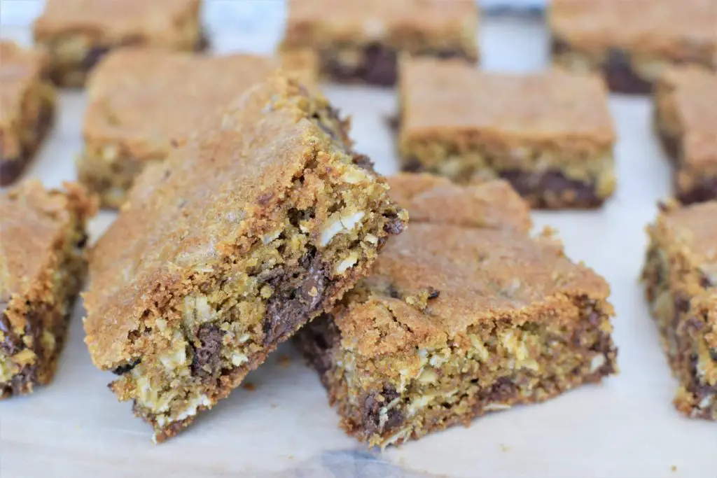 Oatmeal Chocolate Chip Cookie Bars cut up and placed on wax paper - this bread will rise