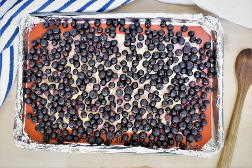 Pan of roasted blueberries - this bread will rise