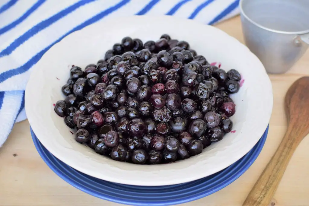 Bowl of roasted blueberries - this bread will rise
