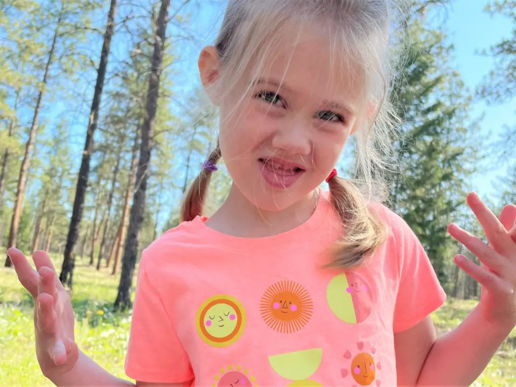 Girl making a silly face for the camera - this bread will rise