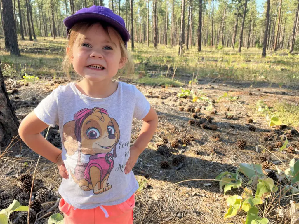 Girl posing in the woods - this bread will rise