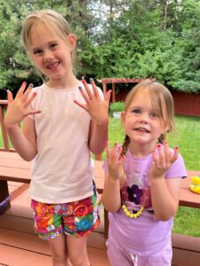 Girls showing painted nails - this bread will rise