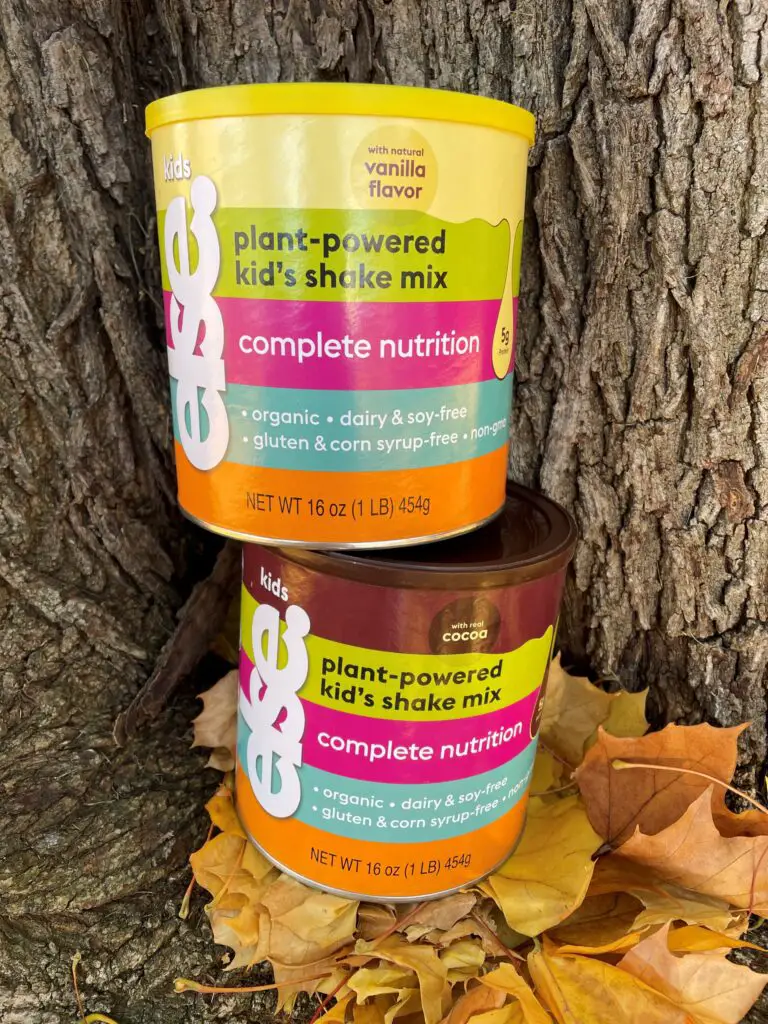 Two cans of Else Nutrition kids' complete nutrition drink sitting against a tree - this bread will rise